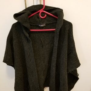 Hoody covertible vest or scarf snaps at side to be